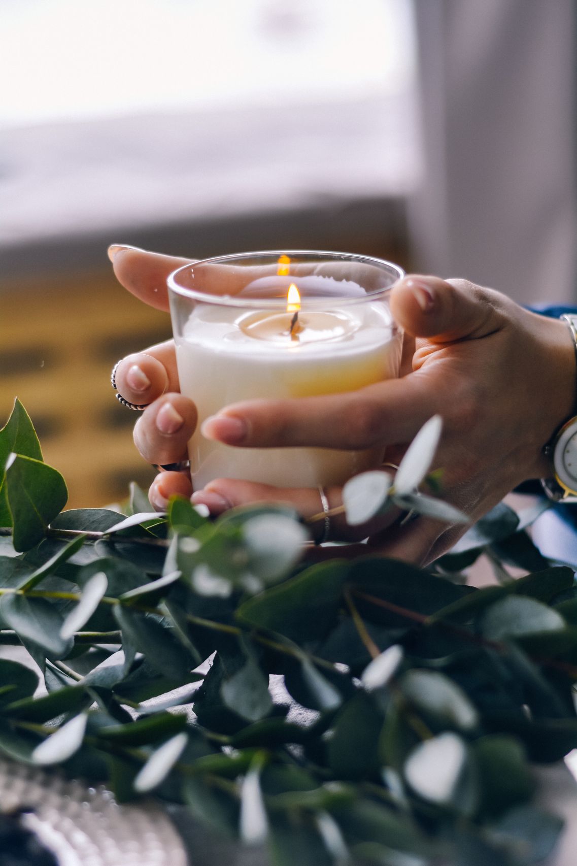Eucalyptus leaves and candle
