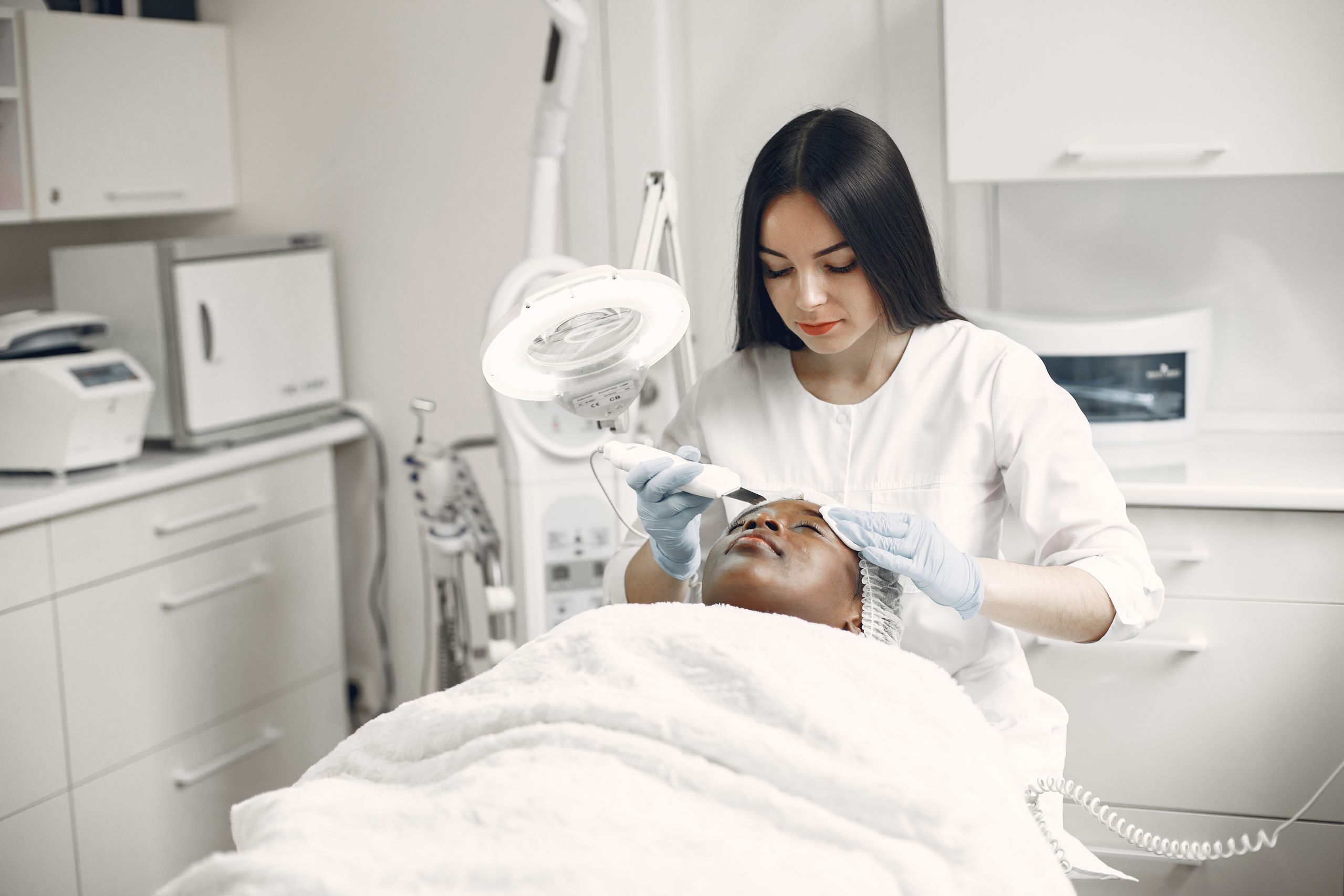 Woman receiving facial mask